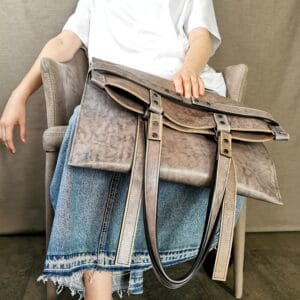 a person holding a purse